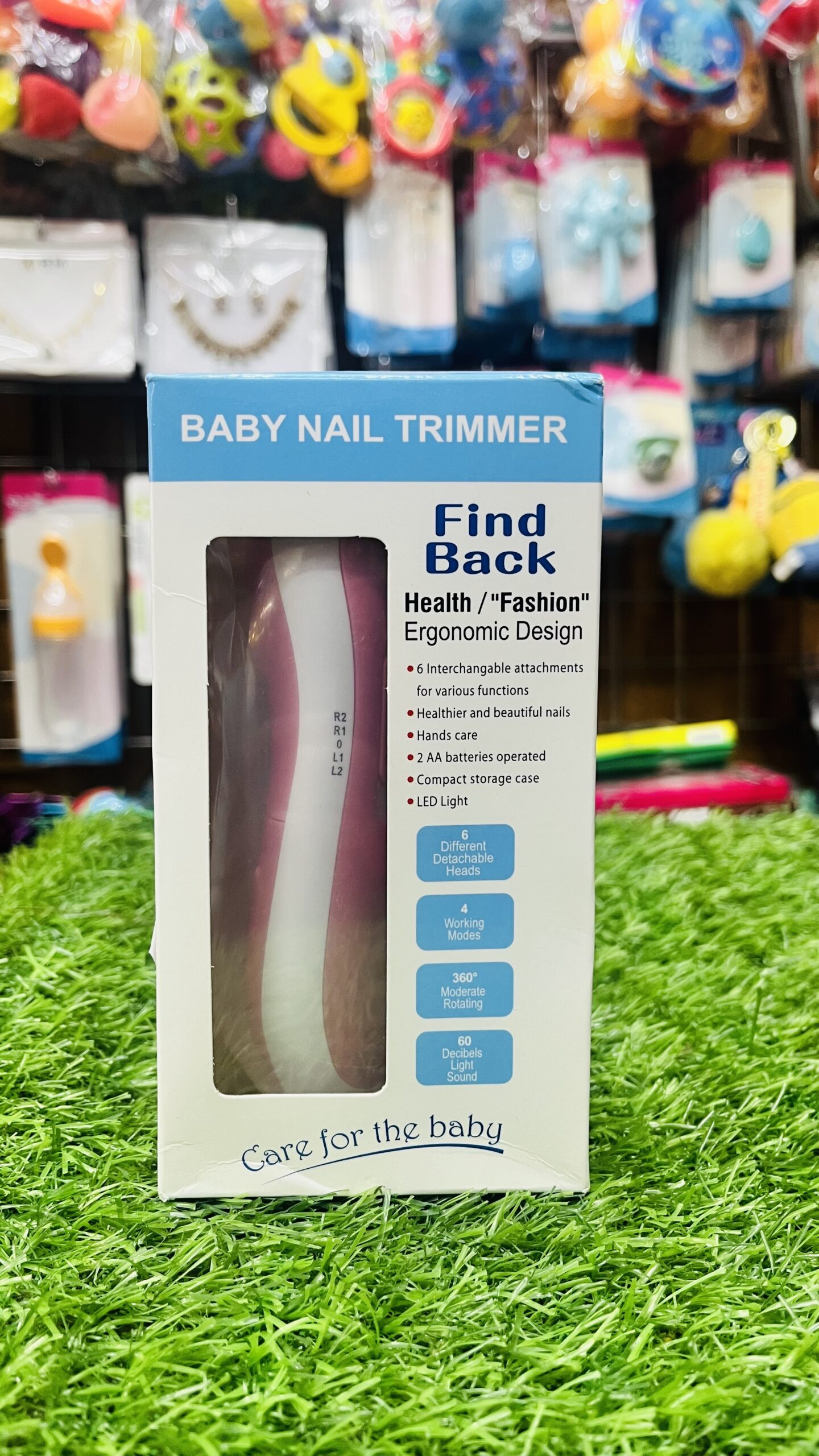 find back electric baby nail trimmer with led light & 6 grinding heads Front box view of Find Back electric baby nail trimmer with LED light showing product features and clear display window