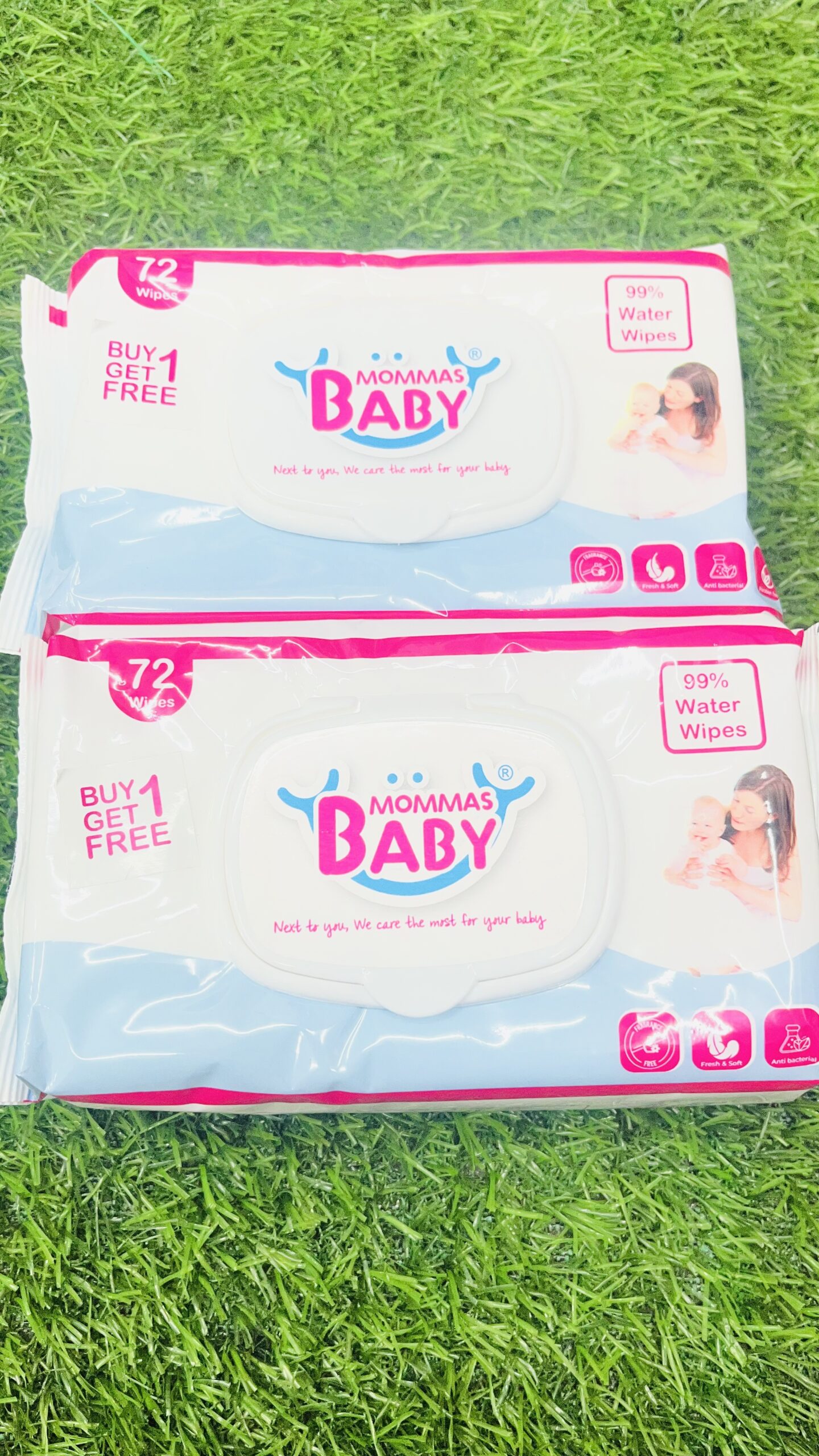 mommas baby 99% water wipes (72 wipes pack of 2 – buy 1 get 1 free) Top down view of two packs of Mommas Baby 99% water wipes 72 wipes buy 1 get 1 free on green grass