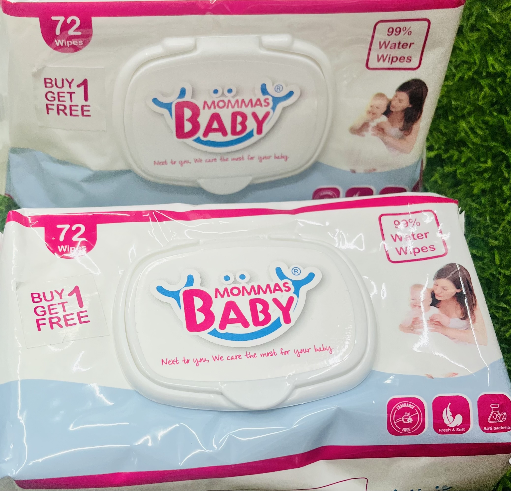mommas baby 99% water wipes (72 wipes pack of 2 – buy 1 get 1 free) Top down view of two packs of Mommas Baby 99% water wipes 72 wipes buy 1 get 1 free on green grass